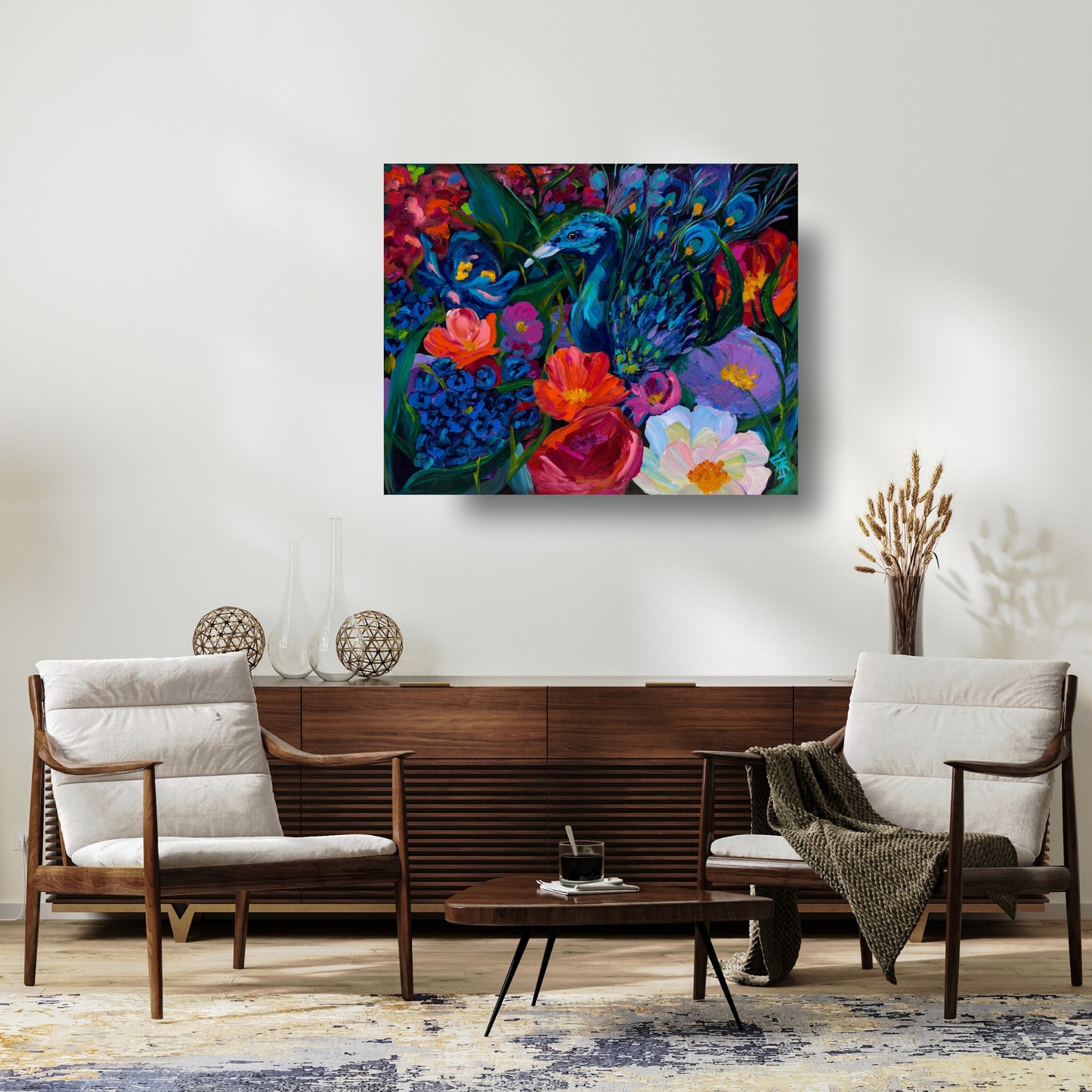 vivid peacock head and feathers peaking out of bold abstract colorful flowers painting in a modern boho living room