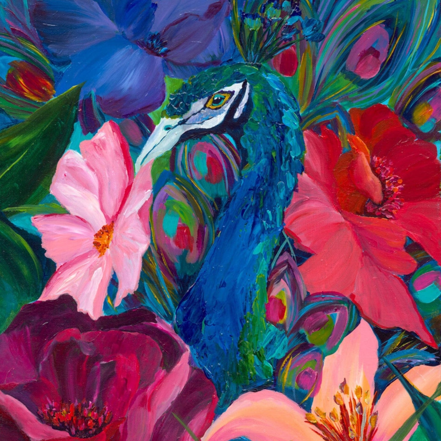 Textured peacock peaking out of vibrant flowers