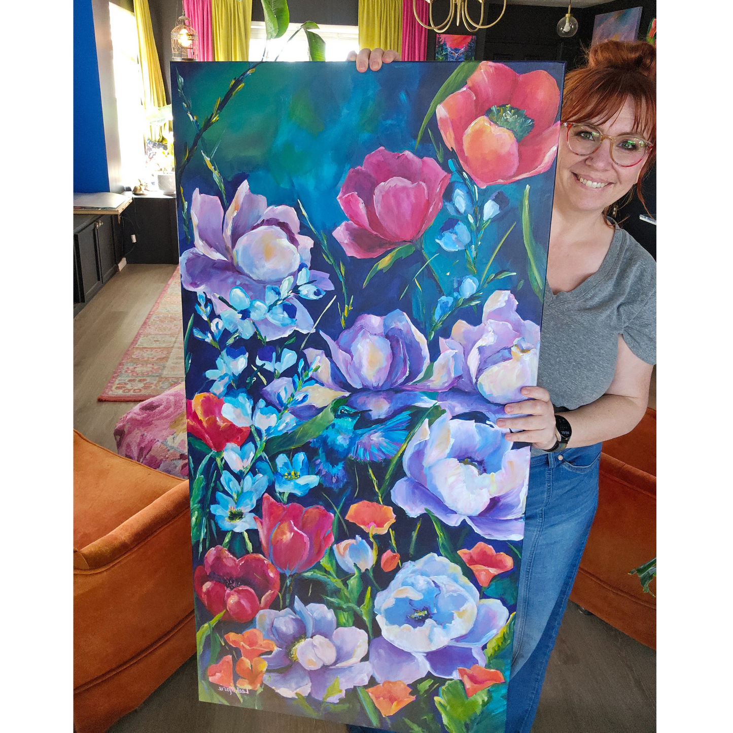 Colorful floral painting with various flowers on a dark background. bold colorful purple flowers with a in flight hummingbird. Jewel tones perfect for a nature lover or a mximalist home decor