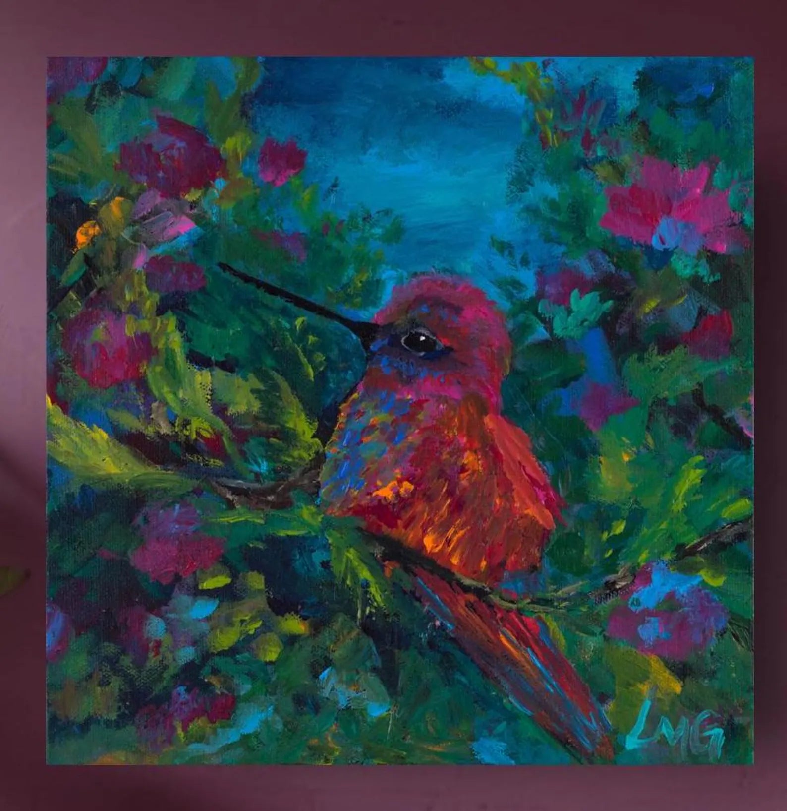 Colorful painting of a hummingbird and flowers on a dark background