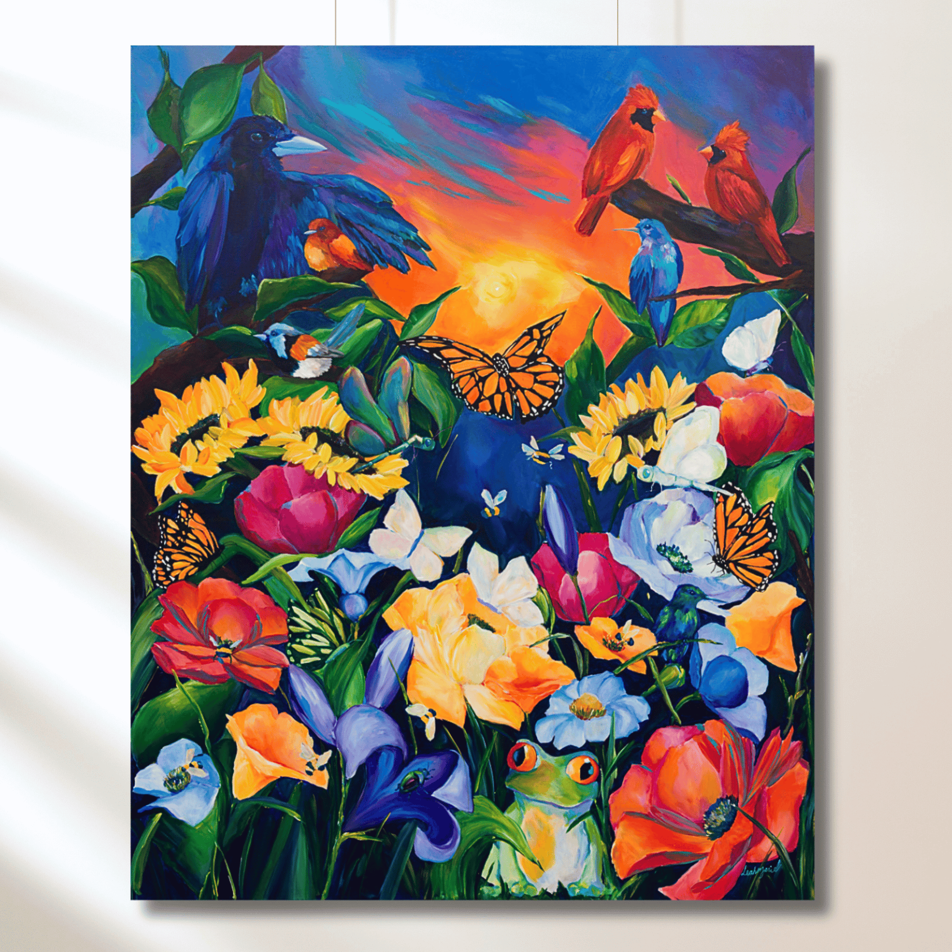 Colorful painting of birds, flowers, and butterflies on a wall. known as annie's project