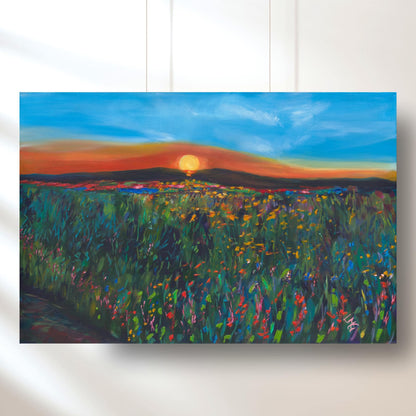 Idaho sunset wildflower print with glowing sun over rolling hills, perfect for adding natural beauty to a peaceful living room.