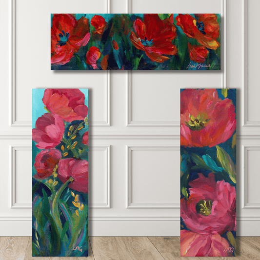 Three vertical floral paintings with red and pink flowers on a white paneled wall.